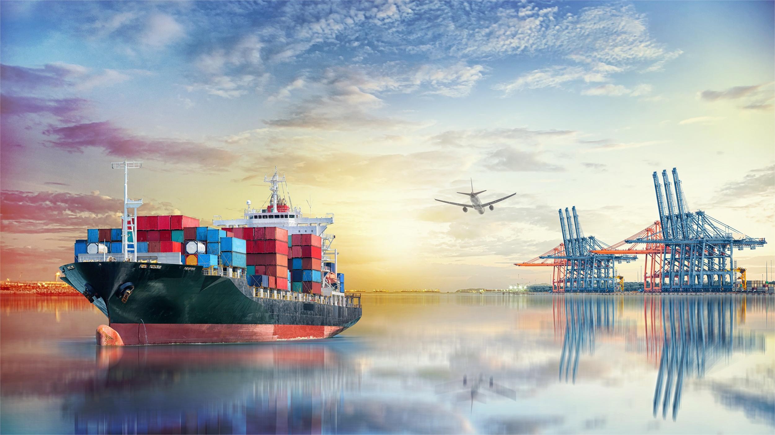 Cargo containers being loaded onto a ship at a busy port, symbolizing FCL shipping from China to France