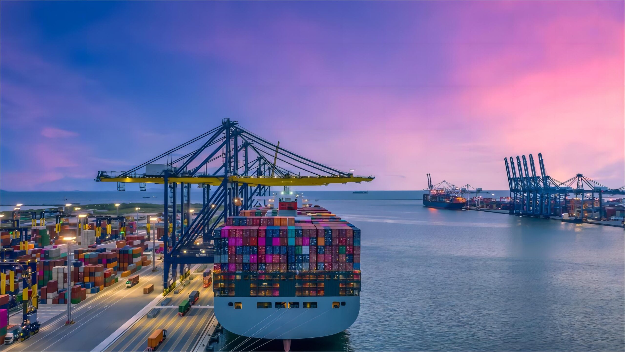 Cargo containers being loaded onto a ship at a busy port in China