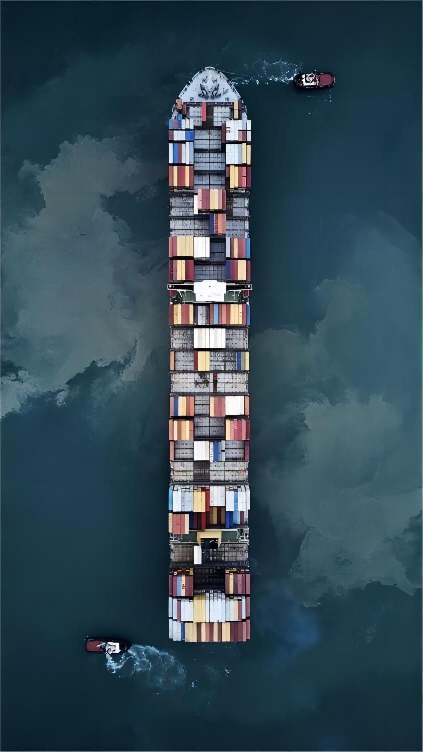 Modern furniture being loaded into a shipping container at a Chinese port