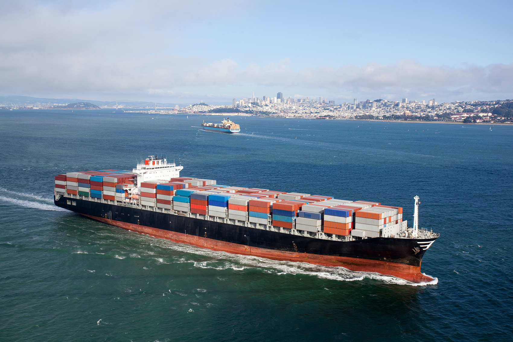 Logistics team managing textile cargo at a Chinese port